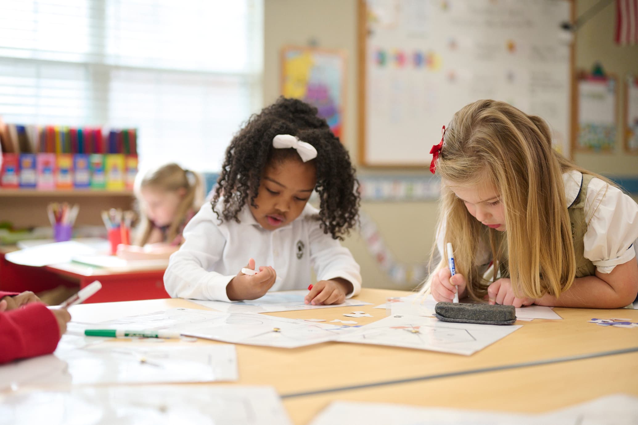 kindergarten students completing classwork